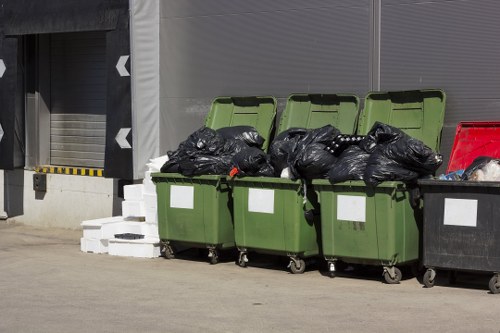 Investigator reviewing commercial waste removal records